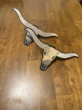 Long horn cow skull strut and coil plates